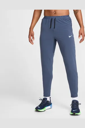 Nike Pantaloni da running in tessuto Dri-FIT Stride – Uomo