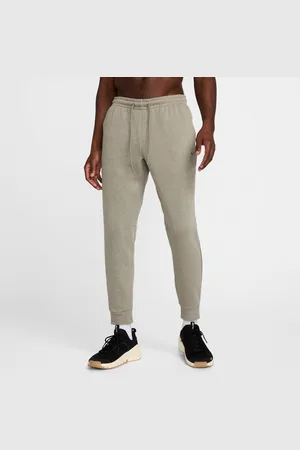 Nike Pantaloni jogger ad alte prestazioni Dri-FIT UV Primary Fleece – Uomo