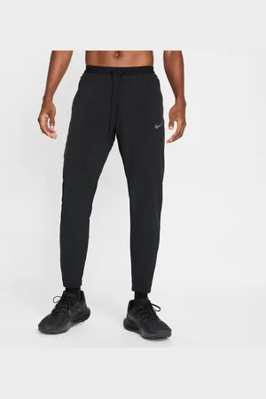 Nike Pantaloni da running in tessuto Dri-FIT Stride – Uomo