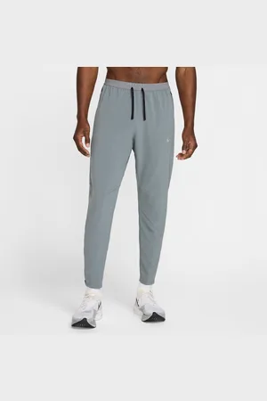 Nike Pantaloni da running in tessuto Dri-FIT Stride – Uomo