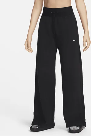 Nike Pantaloni confortevoli in fleece a gamba larga e vita alta Sportswear Phoenix Plush – Donna