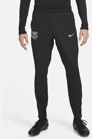 Nike Pantaloni da calcio in maglia Dri-FIT FC Barcelona Strike – Uomo