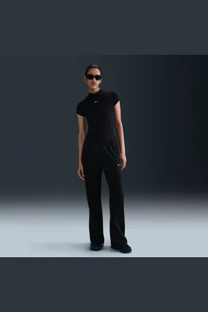 Nike Pantaloni slim fit a vita media in maglia Sportswear Windrunner – Donna