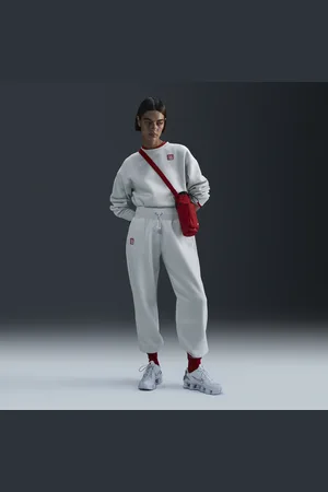 Nike Pantaloni oversize a vita alta Football Liverpool FC Phoenix Fleece da donna – Terza