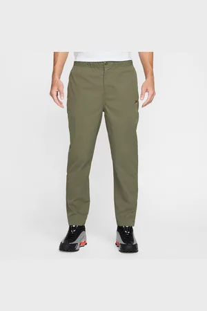 Nike Pantaloni affusolati in tessuto Club – Uomo