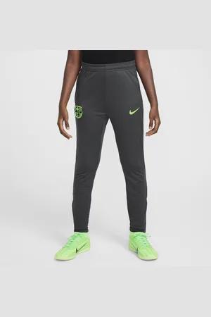 Nike Pantaloni da calcio Dri-FIT FC Barcelona Strike per ragazzo/a – Terza
