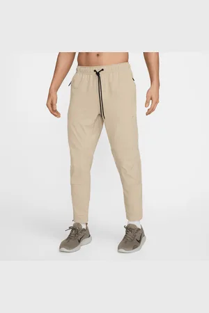 Nike Pantaloni versatili con zip sul bordo Dri-FIT Unlimited – Uomo