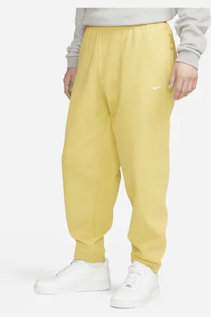 Nike Pantaloni in fleece Solo Swoosh, Uomo
