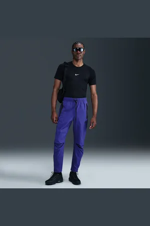Nike Pantaloni in tessuto Tech – Uomo