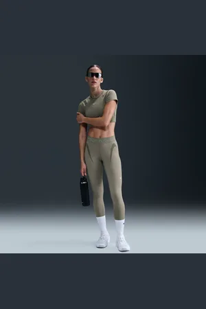 Nike Leggings a 7/8 a vita media con grafica Pro – Donna