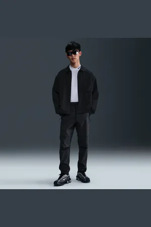 Nike Pantaloni in tessuto Tech – Uomo