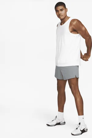 Nike Canotta Dri-FIT versatile Primary – Uomo