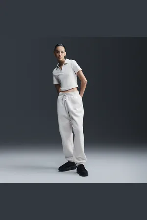 Nike Pantaloni tuta oversize a vita alta Sportswear Phoenix Fleece – Donna