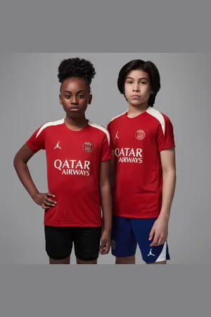 Jordan Maglia da calcio a manica corta Dri-FIT Paris Saint-Germain Strike per ragazzo/a – Quarta