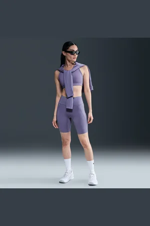 Nike Shorts da ciclista 20 cm a vita alta e sostegno medio con tasche Universa – Donna