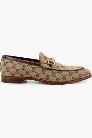 Gucci Mocassino in tessuto gg supreme e pelle - - gender_Man