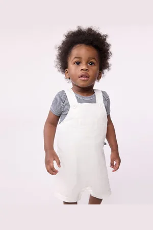 Petit Bateau Salopette corta in cotone tinta unita neonato