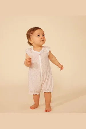 Petit Bateau Tuta corta con stampa a fiori in cotone bebè
