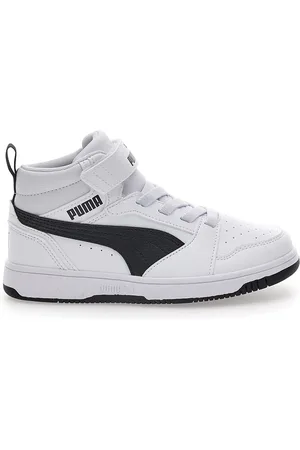 PUMA Sneakers alte bianche e nere Rebound V6 mid