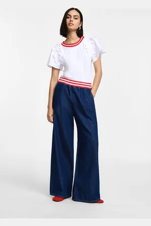 Please Jeans a gamba larga con elastico a righe