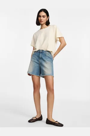 Please Shorts di jeans a taglio vivo
