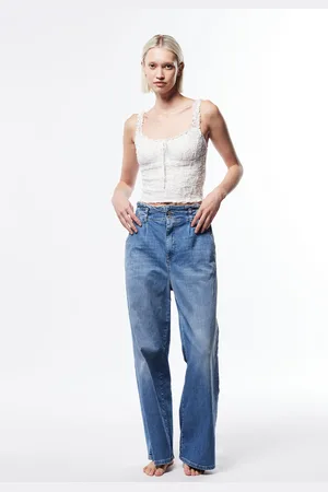 Please Jeans a gamba larga con vita alta