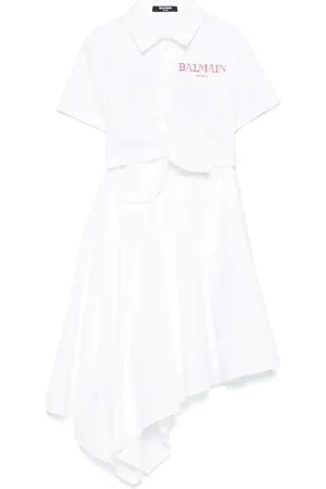 Balmain Abito bianco asimmetrico con mini logo ricmato