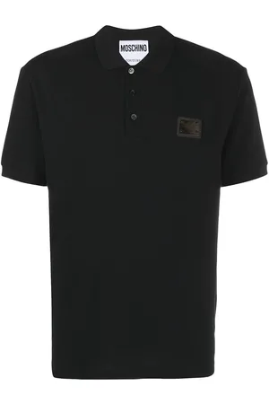 Moschino Polo nera mini placca logo petto