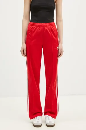 adidas Pantaloni della tuta Firebird colore con applicazione IR8081