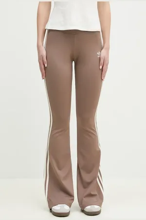 adidas Pantaloni della tuta FLARED LEGGINGS colore beige con applicazione JD4601