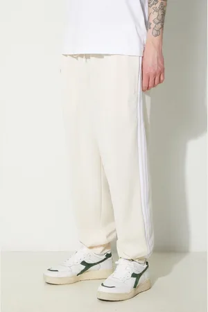 adidas Joggers Adicolor Classics SST colore bianco con applicazione IR9878