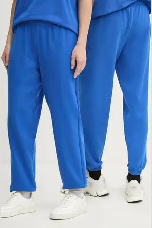 The Pangaia Pantaloni della tuta di cotone colore navy