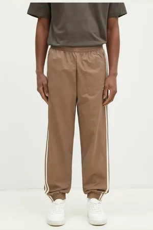 adidas Pantaloni della tuta Firebird colore con applicazione JP1024