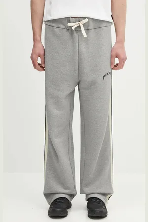 Palm Angels Pantaloni tuta di cotone Curved Logo Track colore PMCH02BS25FLE0010810