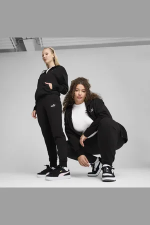 PUMA Pantaloni da tuta con logo ESS N. 1 da donna