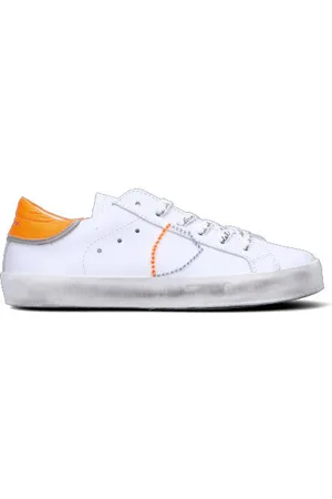 Sneaker bimba bianca/arancio in pelle