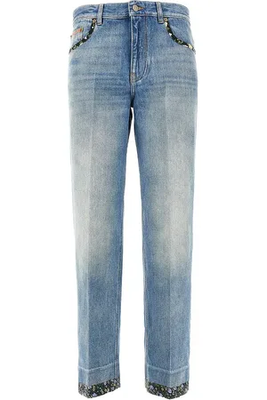 VALENTINO Jeans con bordi in tessuto floreale