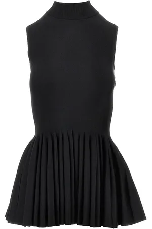 Alaïa Top in maglia con godet