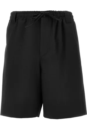 C.9.3 Bermuda in misto lana stretch Uomo 52