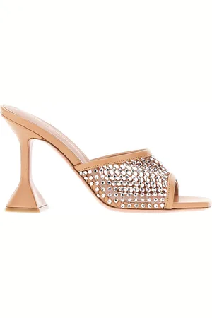 Amina Muaddi Mules Lupita Crystal in rete