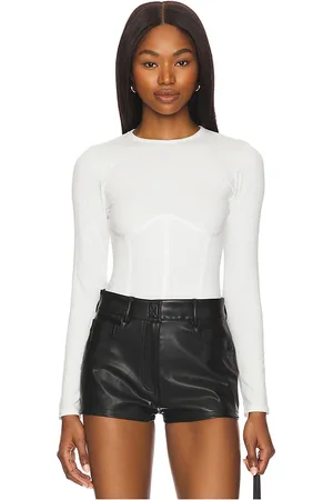 FLEUR DU MAL Organic Cotton Long Sleeve T-shirt Bodysuit in