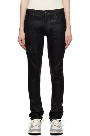 AMIRI Serif Logo Wax Skinny Jeans