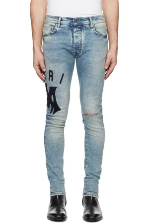 AMIRI Blue Suede Applique Logo Skinny Jeans