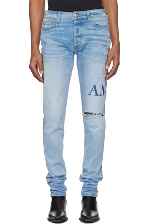 AMIRI Blue Starburst Appliqué Skinny Jeans