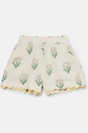 Stella McCartney Pantaloncini elasticizzati con bordi smerlati margherite,
