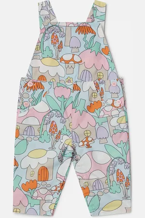 Stella McCartney Salopette in denim con stampa foresta,