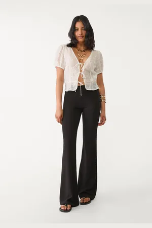 Stradivarius Pantaloni flare in maglia tinta unita M