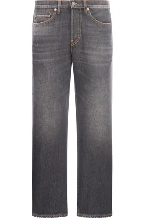 Golden Goose Jeans lavati a gamba larga con toppa con logo