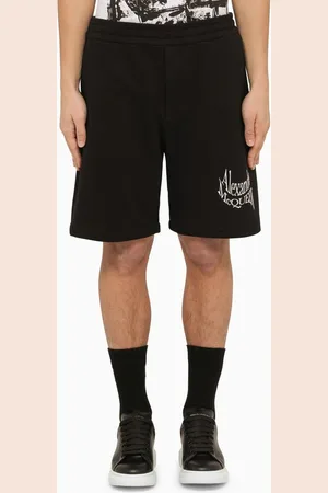Alexander McQueen Bermuda nero con logo distorto