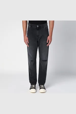 Balmain Jeans nero in denim con usure